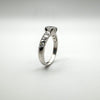 0.50ct CZ Solitaire with CZ Shoulders in Sterling Silver Ring Size K - L