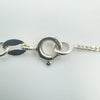Detailed view of 925 stamp on clasp of sterling silver fairy necklace