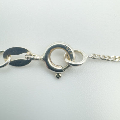 Detailed view of 925 stamp on clasp of sterling silver fairy necklace