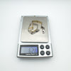 Greek Key bracelet weighing 6.28 grams on digital scale