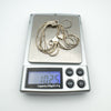 Multi strand sterling silver bracelet weighing 10.25g on digital scale