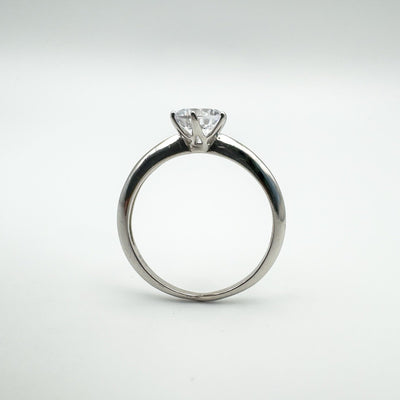 Side view of CZ solitaire ring in sterling silver with raised setting
