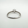 Underside view of solitaire ring with open gallery detail