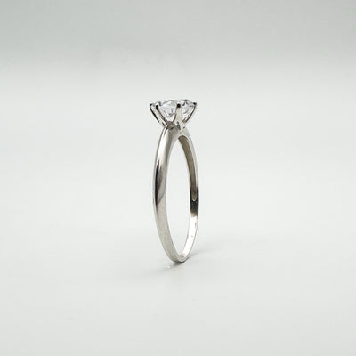Upright angled view of round CZ ring in sterling silver