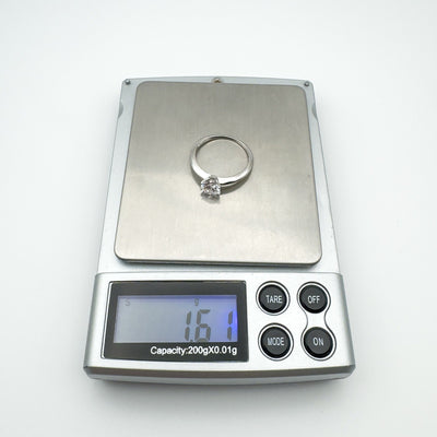 Ring on scale showing weight of 1.61g