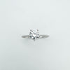 Overhead view showing round cut CZ in 5-claw solitaire setting