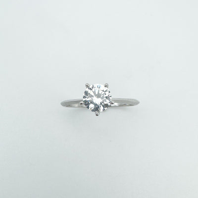 Overhead view showing round cut CZ in 5-claw solitaire setting