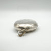 Top view showing large silver bail and engraved edge