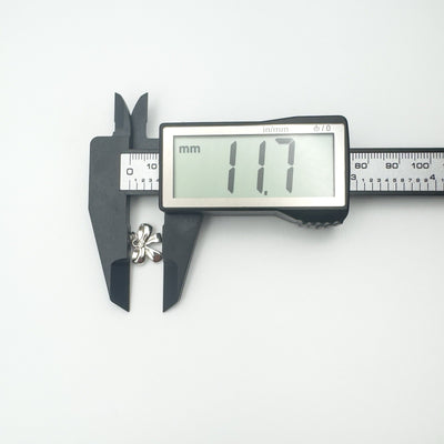 Width of sterling silver bow charm shown at 11.7mm