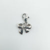 Sterling silver bow pendant charm set with round diamond