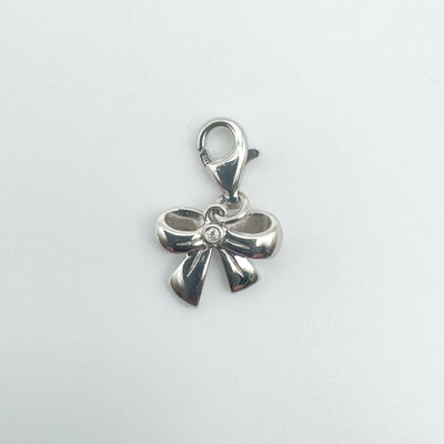  Sterling silver bow pendant charm set with round diamond
