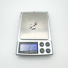 Silver bow charm and diamond pendant weighing 2.1g