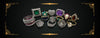Vintage and antique rings with emerald, sapphire, pearl, amethyst and diamond on dark background