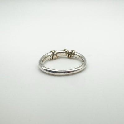 Sterling silver ring with 9ct gold twist and visible 925 hallmark
