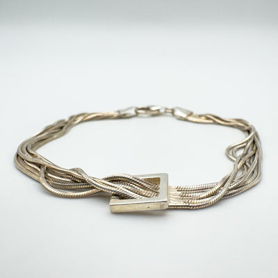 Sterling silver snake box chain bracelet shown from side angle