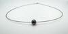 Contemporary 9ct white gold necklace with central black pearl pendant