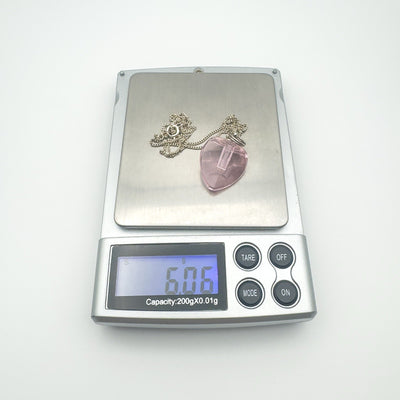 Combined weight of pendant and chain is 6.06g