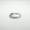 Rear side of silver ring showing gold wire and hallmarks