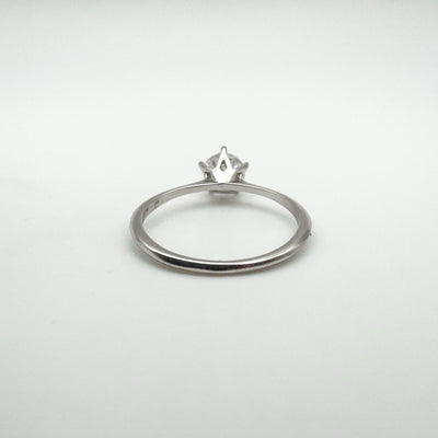 Back of CZ solitaire ring showing 5-claw setting from behind