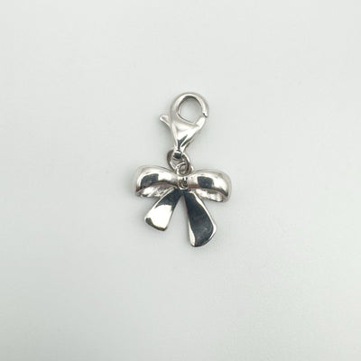 Back view of sterling silver bow charm with lobster clasp