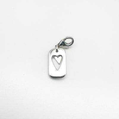 Back of sterling silver diamond heart charm with cut-out design