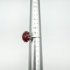Vintage carnelian solitaire ring shown on ring mandrel at UK size O