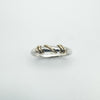 Top view of 9ct gold twisted wire detail on silver band ring