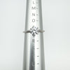 CZ solitaire ring displayed on ring sizer showing UK size P