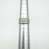 Wide sterling silver ring on mandrel showing UK ring size L