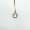Single rose gold threader earring showing faceted CZ stone