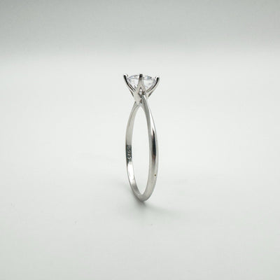 Sterling silver solitaire ring showing CZ and 925 hallmark on inner band