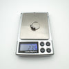 Trilogy ring weighing 2.35g on digital scales