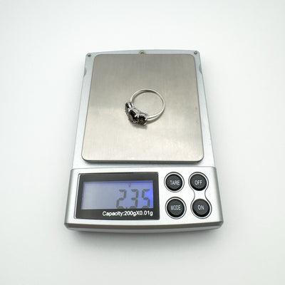 Trilogy ring weighing 2.35g on digital scales