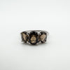 Front view of trilogy ring with three oval Smokey Quartz stones in sterling silver setting