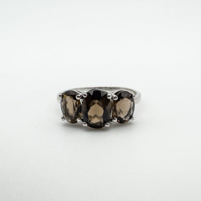 Front view of trilogy ring with three oval Smokey Quartz stones in sterling silver setting