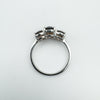 Top view of Smokey Quartz trilogy ring showing gemstone alignment and silver band