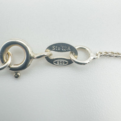 Close-up of sterling silver 925 chain clasp on fairy necklace