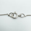  Close-up of the necklace’s spring clasp stamped 925.