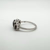 Close up of 925 sterling silver stamp inside band of Smokey Quartz trilogy ring