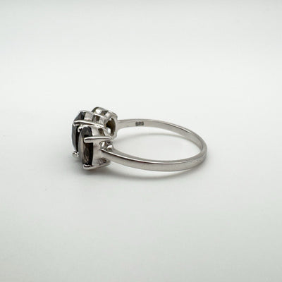 Close up of 925 sterling silver stamp inside band of Smokey Quartz trilogy ring