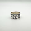 Sterling silver band ring with repeating leaf motif design