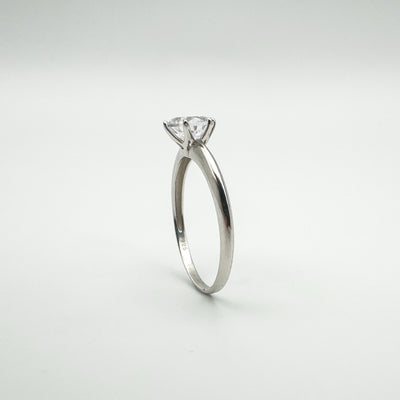 Delicate sterling silver band with CZ solitaire stone