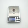 Digital scale showing weight of sterling silver carnelian ring as 3.4g