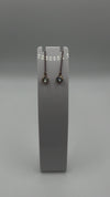 Video showing 14ct rose gold plated threader earrings with cubic zirconia, lightweight and adjustable design