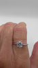 0.90ct CZ solitaire ring in sterling silver shown on finger, highlighting sparkle and fit
